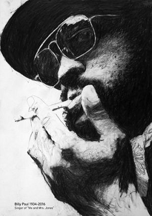 Billy Paul soul singer wearing sunglasses and a hat, he is drawing heavily on a cigarette. He is bearded and wearing a hat, his hand massive in the foreground.